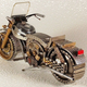 Illustration for article titled Many Watches Died to Make This Miniature Motorcycle